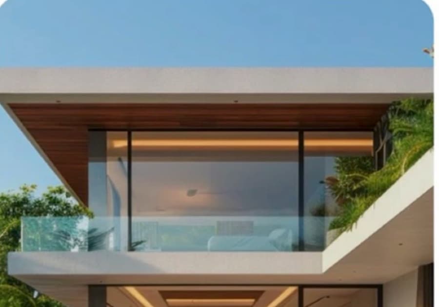 A glass-fronted suite at golden hour